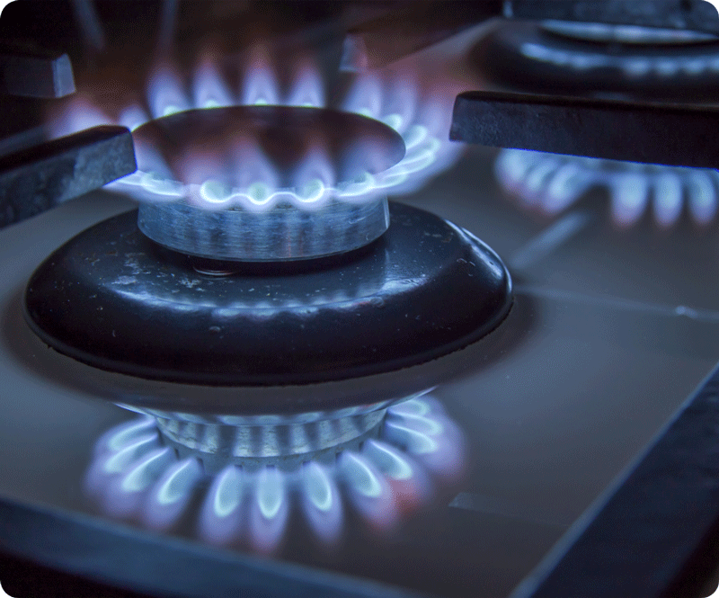 burning-gas-stove-hob-blue-flames-close-up-in-the-2023-11-27-05-20-13-utc