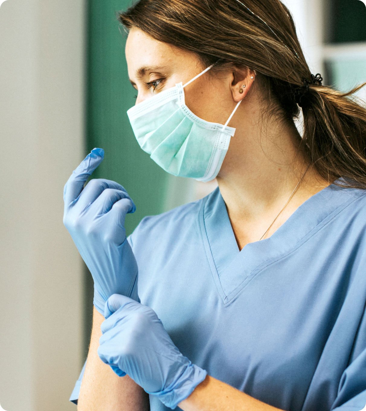 doctor-putting-on-a-glove-to-prevent-coronavirus-c-2023-11-27-04-57-24-utc22