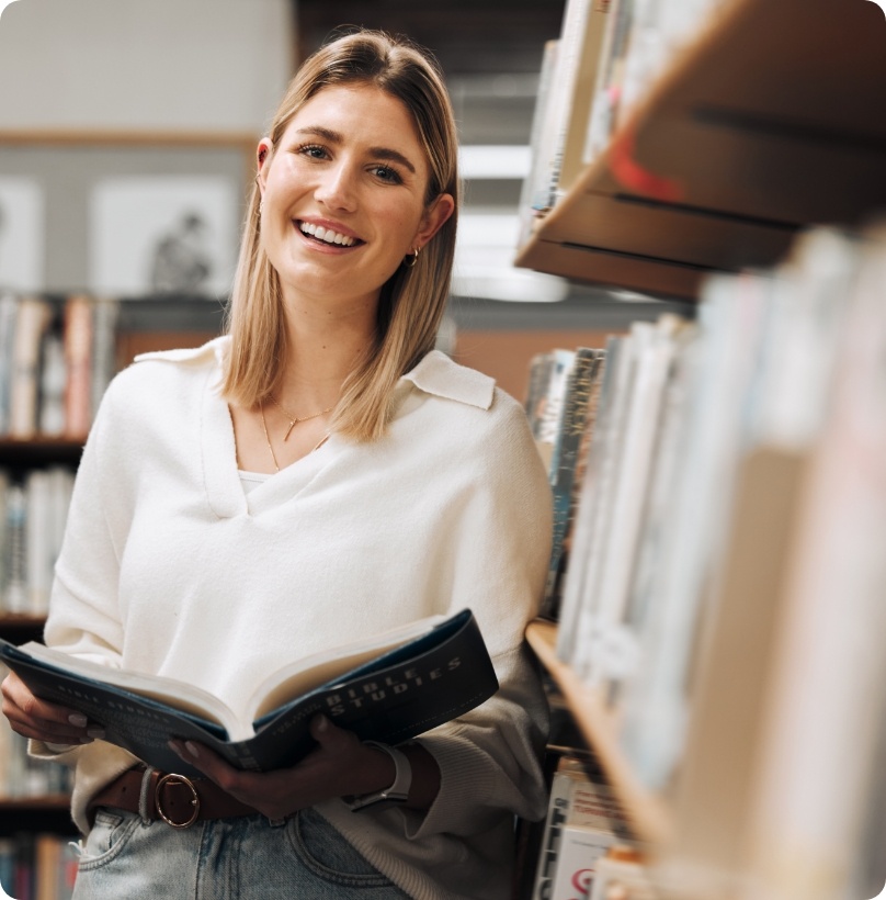 student-reading-or-books-in-library-on-school-un-2023-11-27-05-33-42-utc