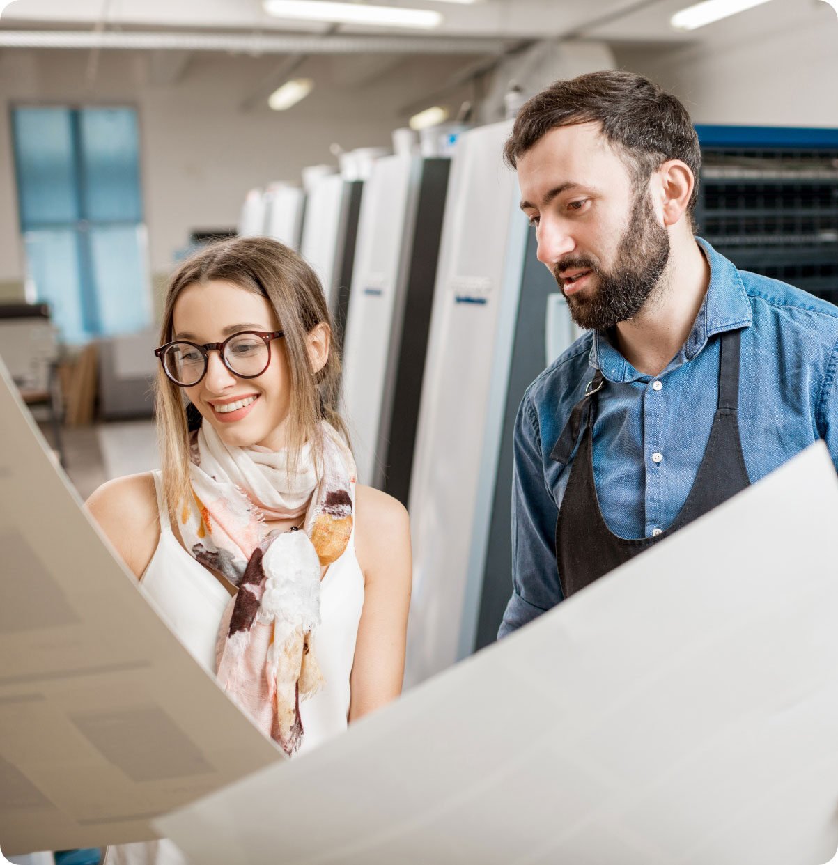 woman-with-print-operator-at-the-printing-manufact-2023-11-27-05-34-38-utc2